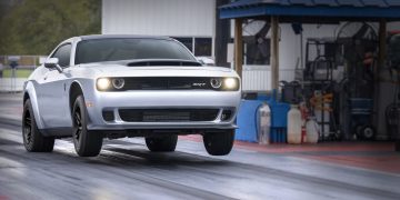 Dodge Challenger SRT Demon 170 doing wheel stand on drag strip