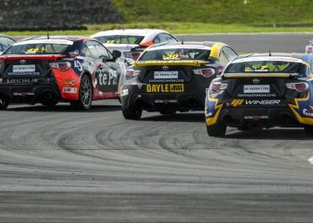 Toyota 86 race cars on track rear view