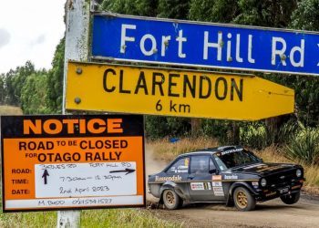 Ford Escort rally car drifting around corner in Otago