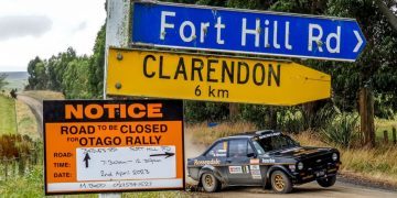 Ford Escort rally car drifting around corner in Otago