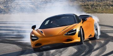 McLaren 750S drifting around corner on track