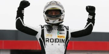 Louis Sharp celebrating British F4 win at Donington Park