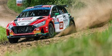 Hayden Paddon driving Hyundai i20 N Rally2 car on dirt