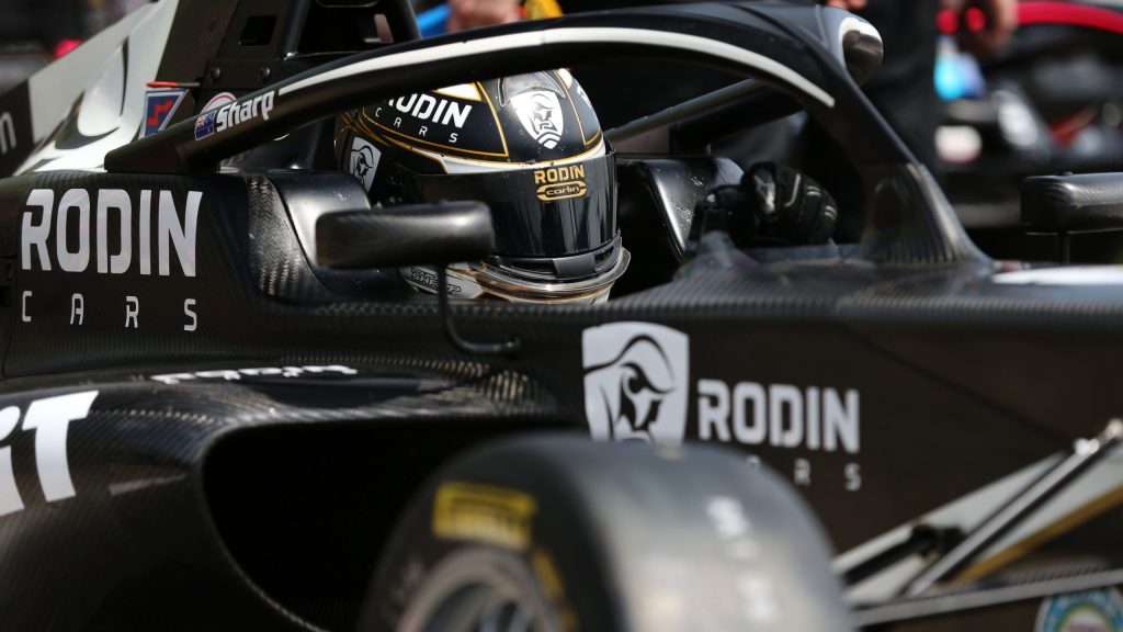 Louis Sharp sitting in British Formula 4 car at Snetterton