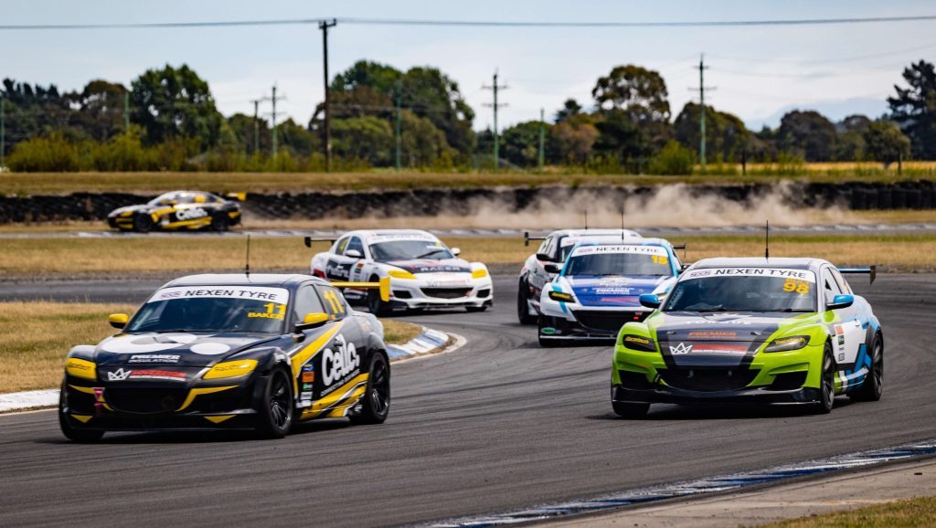 Mazda RX8s racing around Ruapuna