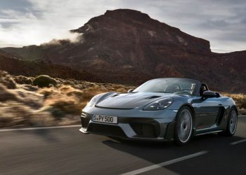 Porsche 718 Boxter Spyder RS driving past mountain