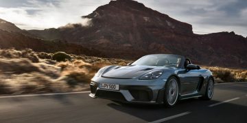 Porsche 718 Boxter Spyder RS driving past mountain