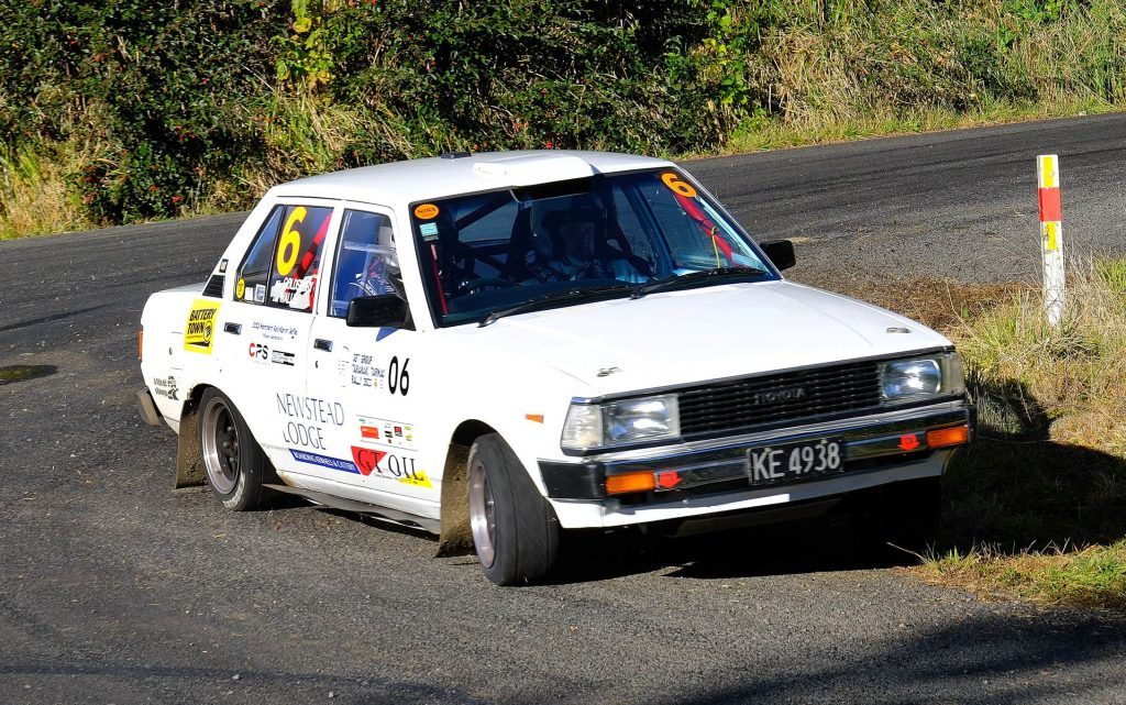 Toyota Corolla sliding around corner in Taranaki Rally 2023