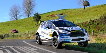 Ford Fiesta rally car jumping on road in Taranaki Rally 2023