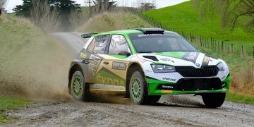 Ben Hunt's Skoda Fabia rally car drifting on gravel road