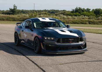 Ford Mustang Dark Horse R driving on race track