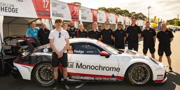 Callum Hedge and team standing with Porsche Carrera Cup car