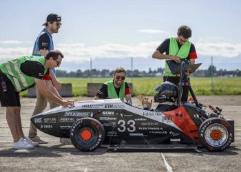 Fastest accelerating EV in the world surrounded by students