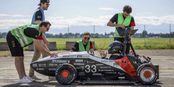 Fastest accelerating EV in the world surrounded by students