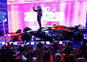 LUSAIL CITY, QATAR - OCTOBER 07: 2023 F1 World Drivers Champion Max Verstappen of the Netherlands and Oracle Red Bull Racing celebrates on his car in parc ferme after the Sprint ahead of the F1 Grand Prix of Qatar at Lusail International Circuit on October 07, 2023 in Lusail City, Qatar. (Photo by Clive Rose/Getty Images) // Getty Images / Red Bull Content Pool // SI202310070487 // Usage for editorial use only //