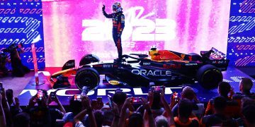 LUSAIL CITY, QATAR - OCTOBER 07: 2023 F1 World Drivers Champion Max Verstappen of the Netherlands and Oracle Red Bull Racing celebrates on his car in parc ferme after the Sprint ahead of the F1 Grand Prix of Qatar at Lusail International Circuit on October 07, 2023 in Lusail City, Qatar. (Photo by Clive Rose/Getty Images) // Getty Images / Red Bull Content Pool // SI202310070487 // Usage for editorial use only //