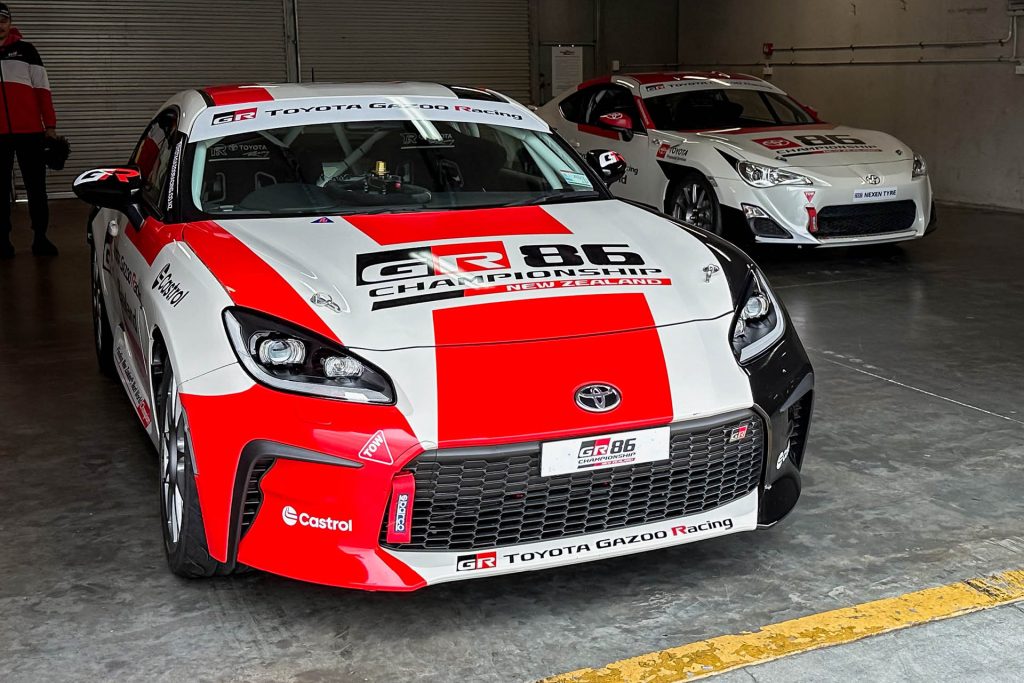 2024 Toyota 86 Championship GR86 parked next to TR86 in pit garage