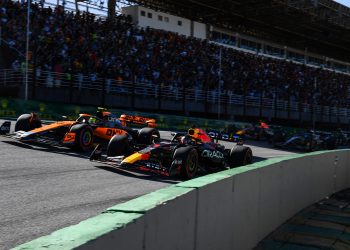 SAO PAULO, BRAZIL - NOVEMBER 04: Max Verstappen of the Netherlands driving the (1) Oracle Red Bull Racing RB19 leads Lando Norris of Great Britain driving the (4) McLaren MCL60 Mercedes on track during the Sprint ahead of the F1 Grand Prix of Brazil at Autodromo Jose Carlos Pace on November 04, 2023 in Sao Paulo, Brazil. (Photo by Rudy Carezzevoli/Getty Images) // Getty Images / Red Bull Content Pool // SI202311040516 // Usage for editorial use only //