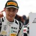 Louis Sharp celebrating first place in British F4 Championship