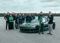 People standing around Rimac Nevera to celebrate Guinness World Record