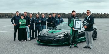 People standing around Rimac Nevera to celebrate Guinness World Record