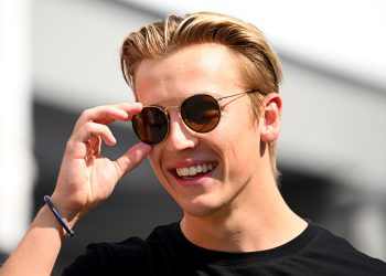 SINGAPORE, SINGAPORE - SEPTEMBER 14: Liam Lawson of New Zealand and Scuderia AlphaTauri walks in the Paddock during previews ahead of the F1 Grand Prix of Singapore at Marina Bay Street Circuit on September 14, 2023 in Singapore, Singapore. (Photo by Clive Mason/Getty Images) // Getty Images / Red Bull Content Pool // SI202309140139 // Usage for editorial use only //