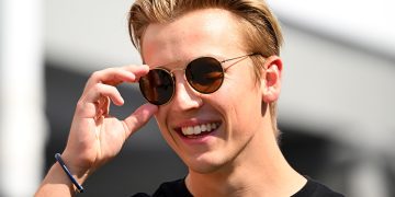 SINGAPORE, SINGAPORE - SEPTEMBER 14: Liam Lawson of New Zealand and Scuderia AlphaTauri walks in the Paddock during previews ahead of the F1 Grand Prix of Singapore at Marina Bay Street Circuit on September 14, 2023 in Singapore, Singapore. (Photo by Clive Mason/Getty Images) // Getty Images / Red Bull Content Pool // SI202309140139 // Usage for editorial use only //