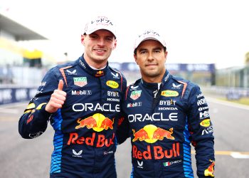 SUZUKA, JAPAN - APRIL 06: Pole position qualifier Max Verstappen of the Netherlands and Oracle Red Bull Racing and Second placed qualifier Sergio Perez of Mexico and Oracle Red Bull Racing celebrate in parc ferme during qualifying ahead of the F1 Grand Prix of Japan at Suzuka International Racing Course on April 06, 2024 in Suzuka, Japan. (Photo by Mark Thompson/Getty Images) // Getty Images / Red Bull Content Pool // SI202404060255 // Usage for editorial use only //