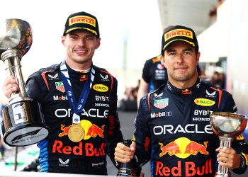 SUZUKA, JAPAN - APRIL 07: Race winner Max Verstappen of the Netherlands and Oracle Red Bull Racing and Second placed Sergio Perez of Mexico and Oracle Red Bull Racing celebrate on the podiu during the F1 Grand Prix of Japan at Suzuka International Racing Course on April 07, 2024 in Suzuka, Japan. (Photo by Mark Thompson/Getty Images) // Getty Images / Red Bull Content Pool // SI202404070315 // Usage for editorial use only //