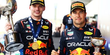 SUZUKA, JAPAN - APRIL 07: Race winner Max Verstappen of the Netherlands and Oracle Red Bull Racing and Second placed Sergio Perez of Mexico and Oracle Red Bull Racing celebrate on the podiu during the F1 Grand Prix of Japan at Suzuka International Racing Course on April 07, 2024 in Suzuka, Japan. (Photo by Mark Thompson/Getty Images) // Getty Images / Red Bull Content Pool // SI202404070315 // Usage for editorial use only //