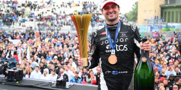 BERLIN, GERMANY - JULY 12: Race winner Mitch Evans of New Zealand and Jaguar TCS Racing celebrates on the podium during the Berlin E-Prix, Round 13 of the 2025 FIA Formula E World Championship at Tempelhof Airport Circuit on July 12, 2025 in Berlin, Germany. (Photo by Simon Galloway/LAT Images for Formula E)