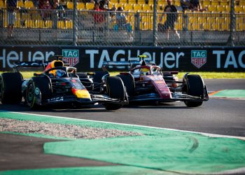 MONZA, ITALY - SEPTEMBER 05: Max Verstappen of the Netherlands driving the (1) Oracle Red Bull Racing RB21 and Lewis Hamilton of Great Britain driving the (44) Scuderia Ferrari SF-25 battle for track position during practice ahead of the F1 Grand Prix of Italy at Autodromo Nazionale Monza on September 05, 2025 in Monza, Italy. (Photo by Sam Bloxham/LAT Images) // Getty Images / Red Bull Content Pool // SI202509050705 // Usage for editorial use only //