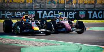 MONZA, ITALY - SEPTEMBER 05: Max Verstappen of the Netherlands driving the (1) Oracle Red Bull Racing RB21 and Lewis Hamilton of Great Britain driving the (44) Scuderia Ferrari SF-25 battle for track position during practice ahead of the F1 Grand Prix of Italy at Autodromo Nazionale Monza on September 05, 2025 in Monza, Italy. (Photo by Sam Bloxham/LAT Images) // Getty Images / Red Bull Content Pool // SI202509050705 // Usage for editorial use only //