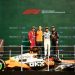 MEXICO CITY, MEXICO - OCTOBER 26: Race winner Lando Norris of Great Britain and McLaren Second placed Charles Leclerc of Monaco and Scuderia Ferrari Third placed Max Verstappen of the Netherlands and Oracle Red Bull Racing and Andrew Jarvis, Performance Engineer at McLaren on the podium during the F1 Grand Prix of Mexico at Autodromo Hermanos Rodriguez on October 26, 2025 in Mexico City, Mexico. (Photo by Hector Vivas/Getty Images) // Getty Images / Red Bull Content Pool // SI202510260891 // Usage for editorial use only //