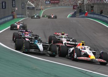 SAO PAULO, BRAZIL - NOVEMBER 09: Liam Lawson of New Zealand driving the (30) Visa Cash App Racing Bulls VCARB 02 and George Russell of Great Britain driving the (63) Mercedes AMG Petronas F1 Team W16 battle for track position ahead of Oliver Bearman of Great Britain driving the (87) Haas F1 VF-25 Ferrari and Pierre Gasly of France driving the (10) Alpine F1 A525 Renault on track during the F1 Grand Prix of Brazil at Autodromo Jose Carlos Pace on November 09, 2025 in Sao Paulo, Brazil. (Photo by Mark Thompson/Getty Images) // Getty Images / Red Bull Content Pool // SI202511090614 // Usage for editorial use only //