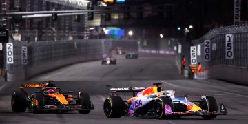 LAS VEGAS, NEVADA - NOVEMBER 22: Isack Hadjar of France driving the (6) Visa Cash App Racing Bulls VCARB 02 leads Oscar Piastri of Australia driving the (81) McLaren MCL39 Mercedes on track during the F1 Grand Prix of Las Vegas at Las Vegas Strip Circuit on November 22, 2025 in Las Vegas, Nevada. (Photo by Clive Rose/Getty Images) // Getty Images / Red Bull Content Pool // SI202511230268 // Usage for editorial use only //