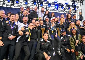 MIAMI, FLORIDA - JANUARY 31: Race winner Mitch Evans of New Zealand and Jaguar TCS Racing celebrates with Antonio Felix da Costa of Portugal and Jaguar TCS Racing, Ian James, Team Principal of Jaguar TCS Racing and team members on the podium during the Miami E-Prix, Round 3 of the 2026 FIA Formula E World Championship at Miami International Autodrome on January 31, 2026 in Miami, Florida. (Photo by Simon Galloway/LAT Images)