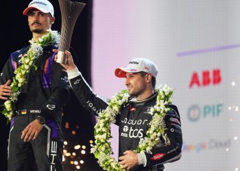 JEDDAH, SAUDI ARABIA - FEBRUARY 13: Third placed Mitch Evans of New Zealand and Jaguar TCS Racing celebrates on the podium during the Jeddah E-Prix, Round 4 of the 2026 FIA Formula E World Championship at Jeddah Corniche Circuit on February 13, 2026 in Jeddah, Saudi Arabia. (Photo by Oscar Lumley/LAT Images)