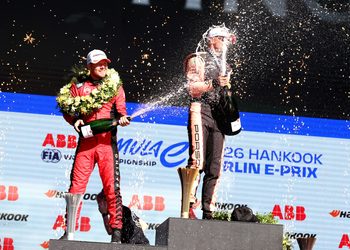 BERLIN, GERMANY - MAY 02: Second placed Nick Cassidy of New Zealand and Citroen Racing celebrates with Race winner Nico Muller of Switzerland and Porsche Formula E Team on the podium during the Berlin E-Prix, Round 7 of the 2026 FIA Formula E World Championship at Tempelhof Airport Circuit on May 02, 2026 in Berlin, Germany. (Photo by Simon Galloway/LAT Images)