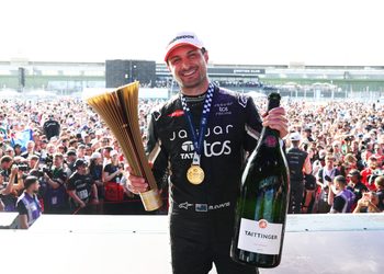 BERLIN, GERMANY - MAY 03: Race winner Mitch Evans of New Zealand and Jaguar TCS Racing celebrates on the podium during the Berlin E-Prix, Round 8 of the 2026 FIA Formula E World Championship at Tempelhof Airport Circuit on May 03, 2026 in Berlin, Germany. (Photo by Simon Galloway/LAT Images)