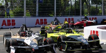 SANYA, CHINA - JUNE 20: Mitch Evans of New Zealand driving the (9) Jaguar TCS Racing Jaguar I-TYPE 7 battles with Felipe Drugovich of Brazil driving the (28) Andretti Formula E Porsche 99X Electric during the Sanya E-Prix, Round 11 of the 2026 FIA Formula E World Championship at Sanya Street Circuit on June 20, 2026 in Sanya, China. (Photo by Simon Galloway/LAT Images)