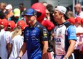 BUDAPEST, HUNGARY - JULY 26: Isack Hadjar of France and Oracle Red Bull Racing and Liam Lawson of New Zealand and Visa Cash App Racing Bulls talk on the drivers parade prior to the F1 Grand Prix of Hungary at Hungaroring on July 26, 2026 in Budapest, Hungary. (Photo by Sam Bloxham/LAT Images) // Getty Images / Red Bull Content Pool // SI202607260192 // Usage for editorial use only //