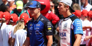 BUDAPEST, HUNGARY - JULY 26: Isack Hadjar of France and Oracle Red Bull Racing and Liam Lawson of New Zealand and Visa Cash App Racing Bulls talk on the drivers parade prior to the F1 Grand Prix of Hungary at Hungaroring on July 26, 2026 in Budapest, Hungary. (Photo by Sam Bloxham/LAT Images) // Getty Images / Red Bull Content Pool // SI202607260192 // Usage for editorial use only //